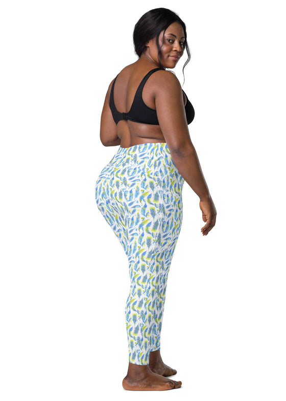 Plus-size model showcasing the back design of Teal Feather Print High-Waisted Compression Leggings, designed for comfort, flexibility, and a secure fit during workouts.