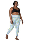 Plus-size model wearing Teal Feather Print High-Waisted Compression Leggings, offering tummy control, flexible fit, and breathable fabric for women’s workouts.