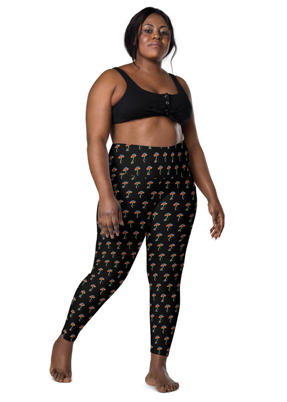 Plus-size woman in Zen Frog black high-waisted leggings with pockets, showing front view, designed for comfort, support, and style for all body types.