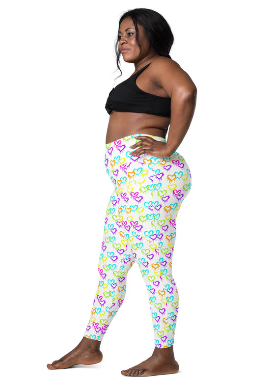 Plus-size woman wearing Melting Hearts White Compression Leggings, showing the side. High-waisted leggings with pockets, providing both comfort and style.