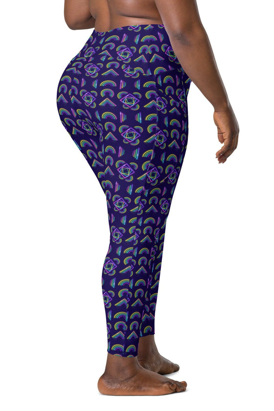 Plus size woman showing the back of Neon Rainbow Navy High Rise Leggings, designed with a double-layer waistband for extra support during intense workouts.