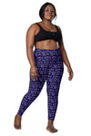 Plus size woman wearing Neon Rainbow Navy High Rise Leggings, front view, highlighting the comfortable, flattering fit and vibrant rainbow design for active wear.