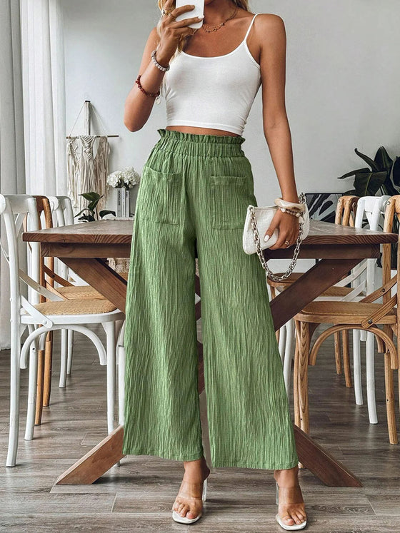 Front view of Pocketed Elastic Waist Wide Leg Pants in green, featuring a relaxed wide-leg fit and practical pockets.