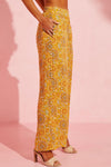 Side view of the Pocketed Floral Wide Leg Pants, highlighting the wide-leg style and vibrant floral design.