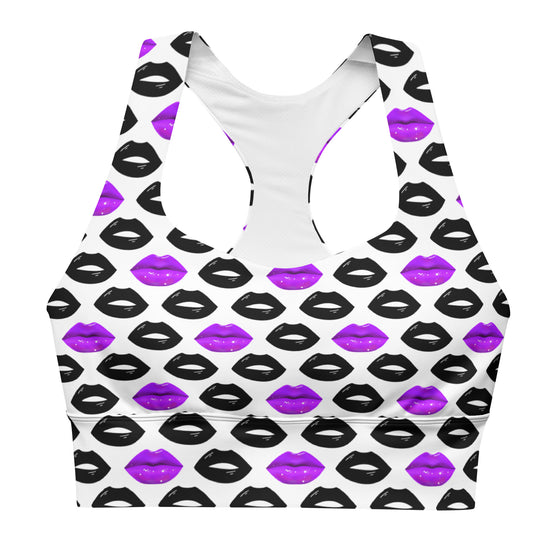 Closeup of purple and black lips print on Pop Lips white sports bra. Double-layered front with longline silhouette and removable padded inserts.
