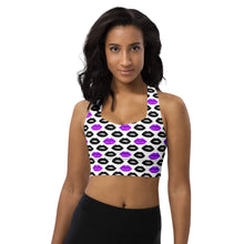  Model wearing Pop Lips white high impact longline sports bra with purple and black lips print. Racerback cut and compression fit perfect for gym workouts.