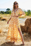 Model styled in the Printed Half Sleeve Top and Slit Skirt Set at a sunny outdoor location, ideal for summer gatherings.