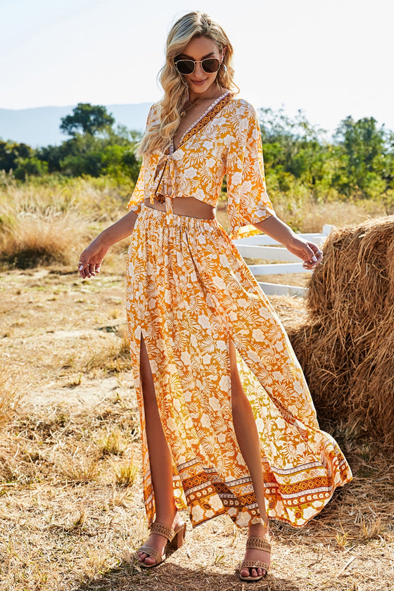 Model styled in the Printed Half Sleeve Top and Slit Skirt Set at a sunny outdoor location, ideal for summer gatherings.