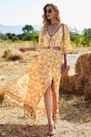 Model styled in the Printed Half Sleeve Top and Slit Skirt Set at a sunny outdoor location, ideal for summer gatherings.