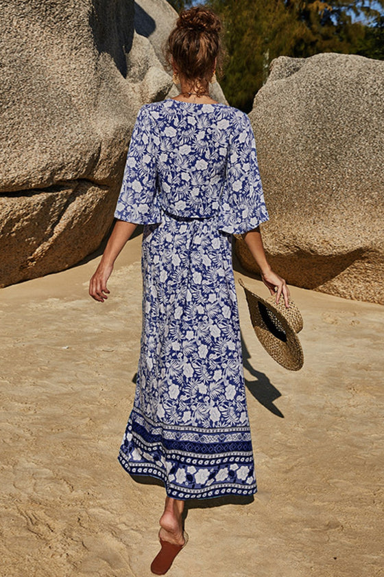 Back view of the floral two-piece set, showcasing the full skirt length and elegant fit.