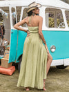 Back view of the Printed Halter Neck Maxi Dress with adjustable tied straps.