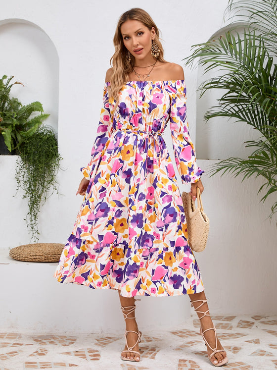 Front view of the Printed Long Sleeve Midi Dress showcasing its vibrant prints, tied waist, and off-shoulder neckline.