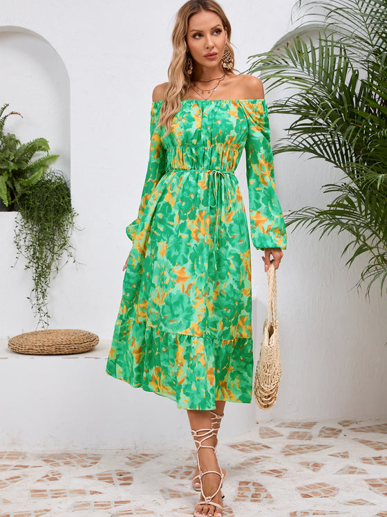 Front view of the Printed Long Sleeve Midi Dress showcasing its vibrant prints, tied waist, and off-shoulder neckline.