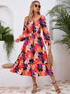 Front view of the Printed Long Sleeve Midi Dress showcasing its vibrant prints, tied waist, and off-shoulder neckline.