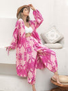  Front view of the Printed Open Front Top and Pants Set, showcasing the bold pink pattern and relaxed fit.