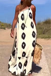 Front view of the printed single shoulder maxi dress, showcasing the bold print and flowing design.