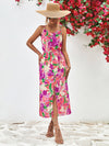 Front view of Printed Spaghetti Strap Front Slit Dress with vibrant floral print and V-neckline.