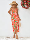 Front view of Printed Spaghetti Strap Front Slit Dress with vibrant floral print and V-neckline.