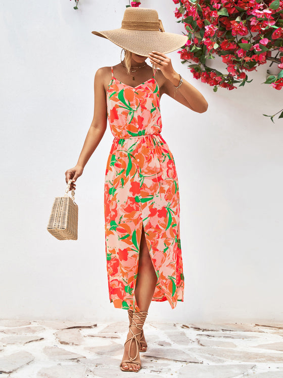 Front view of Printed Spaghetti Strap Front Slit Dress with vibrant floral print and V-neckline.