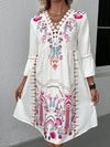 Front view focusing on the relaxed structure of the white printed fabric and the subtle shape created by the waist seam.

