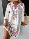 Front image capturing the white dress mid-motion, with sleeves and skirt gently flowing, enhancing the lightweight fabric’s texture.


