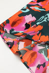 Close view of the Printed Tie Neck Lantern Sleeve Mini Dress, emphasizing the flowy silhouette and vibrant print.