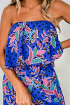 Close-up of the floral and geometric print on the Printed Tube Jumpsuit, highlighting its vibrant colors.