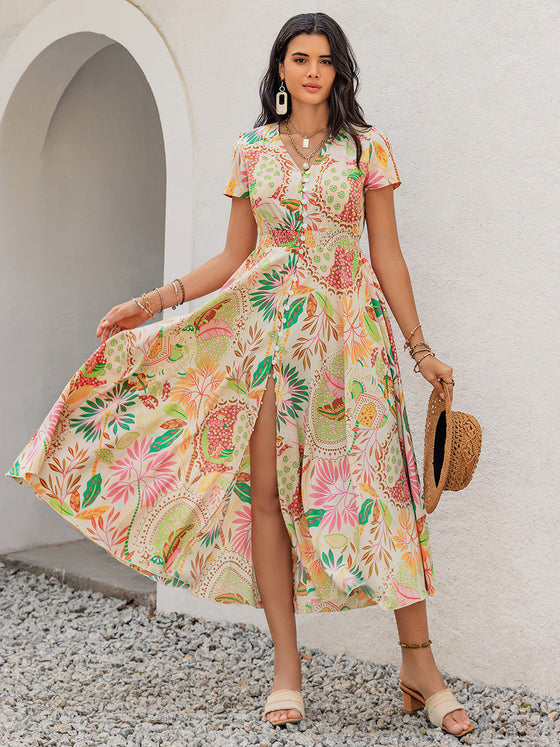 Front view of the Printed V-Neck Short Sleeve Midi Dress with a vibrant floral print and buttoned front.