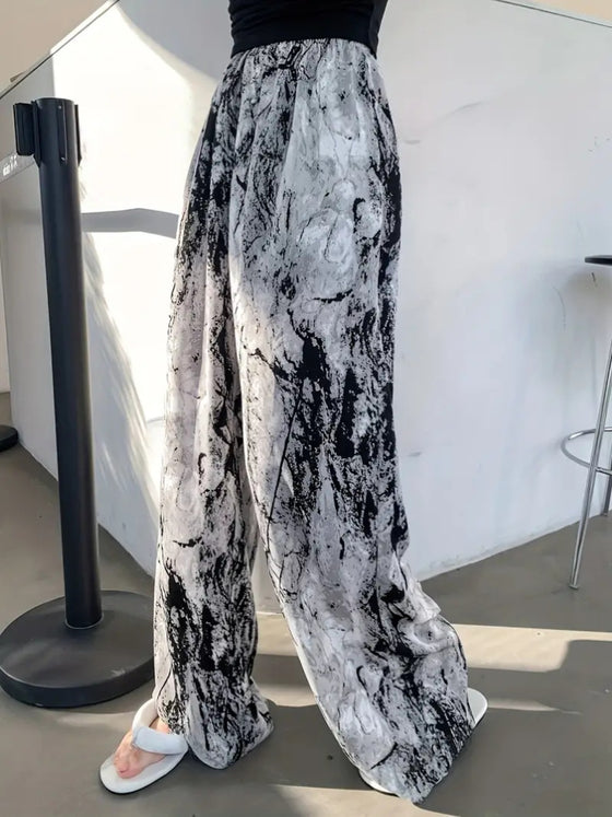 Side view of Printed Wide Leg Pants highlighting the wide-leg cut and relaxed fit.