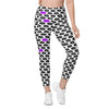 Front view of woman wearing high waist white leggings with bold purple lips and moth-like black lips print. Stylish leggings with pockets for active women.