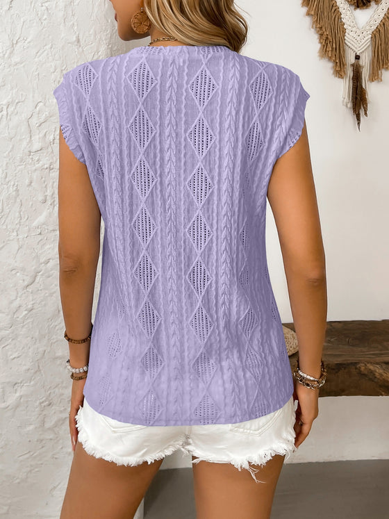 Back view highlights the gentle scallop trim and lightly flared hem, adding softness and flow.

