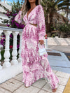 Full front view of the Purple Printed Maxi Dress with dramatic ruffles and a bold plunge neckline, enhanced with central cutouts and a flowing, romantic silhouette.