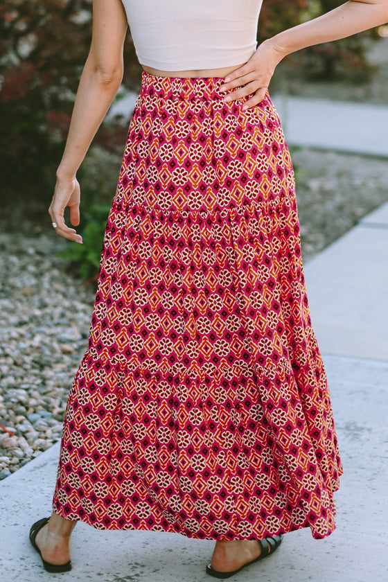Back view of the Rose Printed Tiered Maxi Skirt showing the gathered waistband and floral detail from behind.

