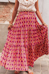  Front view of the Rose Printed Tiered Maxi Skirt featuring elegant tiers and a soft floral print.