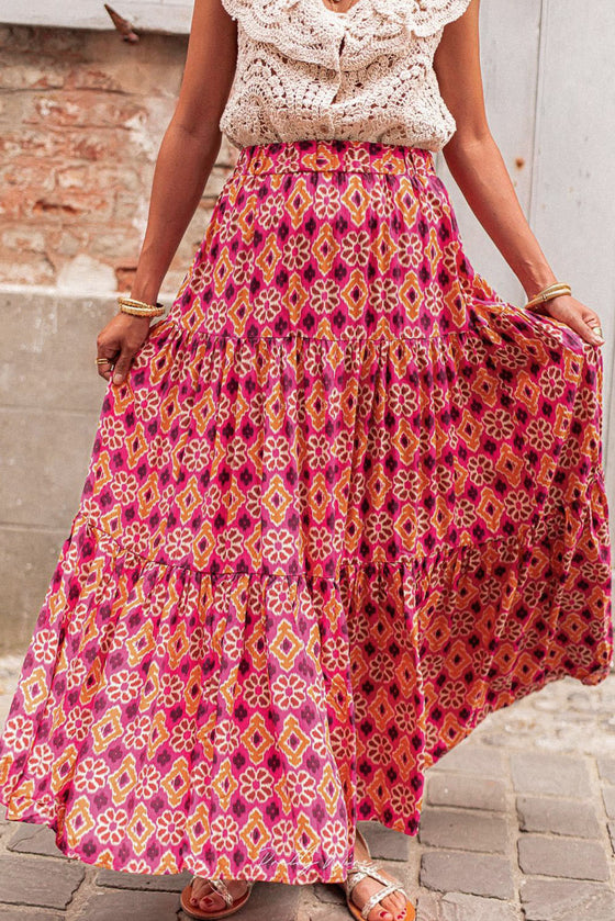  Front view of the Rose Printed Tiered Maxi Skirt featuring elegant tiers and a soft floral print.