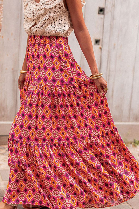  Side view of the Rose Printed Tiered Maxi Skirt highlighting its cascading layers and comfortable fit.