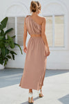 Back view of the Ruched One Shoulder Top and Slit Skirt Set, featuring a smooth, flowy fabric and structured fit.