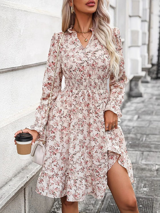 Front view of the Ruffle Hem Floral Surplice Long Sleeve Dress featuring a floral print and ruffle details.