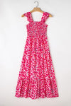 Front view of the Ruffled Printed Wide Strap Dress, featuring a ruffled bodice and vibrant print.