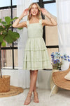 A front image emphasizing the sophisticated striped print that adds a touch of refinement to the playful ruffled mini dress.-4c6e-ab74-2ad5ef070ba9-Min