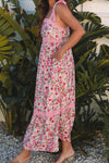 Full side profile of the pink floral dress with square neck and pockets, showing its flared hem and elegant silhouette for sunny weather style.