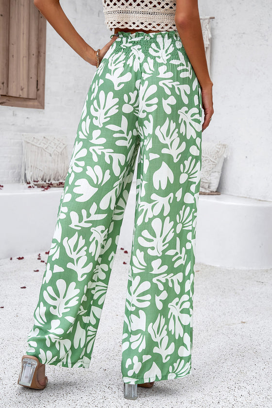 Side view of the Smocked Printed Wide Leg Pants showing the flowy, relaxed fit.