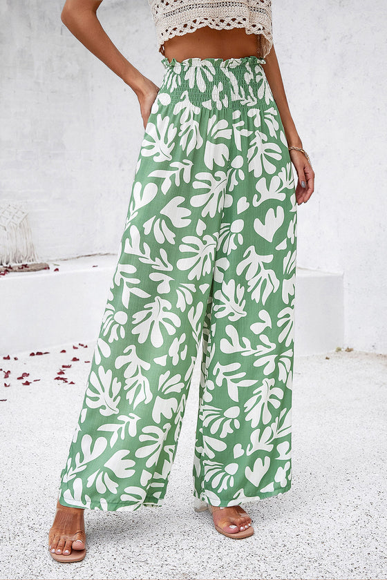 Side view of the Smocked Printed Wide Leg Pants showing the flowy, relaxed fit.