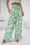 Side view of the Smocked green Printed Wide Leg Pants showing the flowy, relaxed fit.