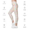 Side angle of women’s high waist leggings with pastel floral, bee, and butterfly print. Lightweight compression leggings with pockets for spring fashion.
