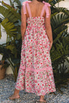 Full back view of the pink floral dress with a square neckline, showcasing its relaxed fit and soft fabric—designed for flow and all-day wear.