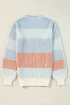 Back view of the Striped Color Block Round Neck Long Sleeve Sweater with colorful stripes in pink, orange, and white.