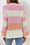 Back view of the Striped Color Block Round Neck Long Sleeve Sweater with colorful stripes in pink, orange, and white.