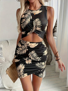  Model wearing a tan mini dress with all-over print, sleeveless cut, and lightweight fabric—perfect for casual summer outings.