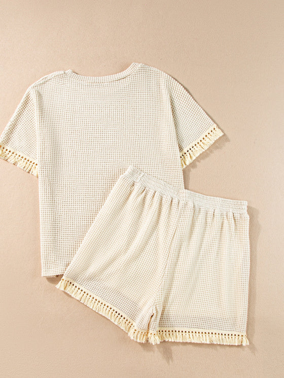 Front view of the Tassel Round Neck Top and Shorts Set featuring tassel details on the sleeves and shorts.